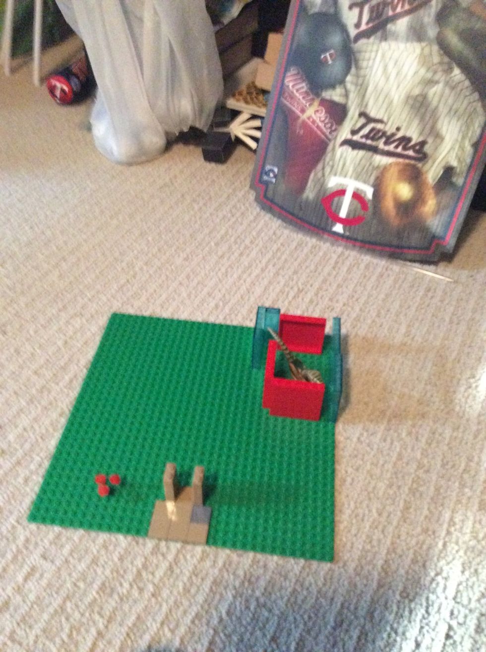 Next put the dinosaur into the cage