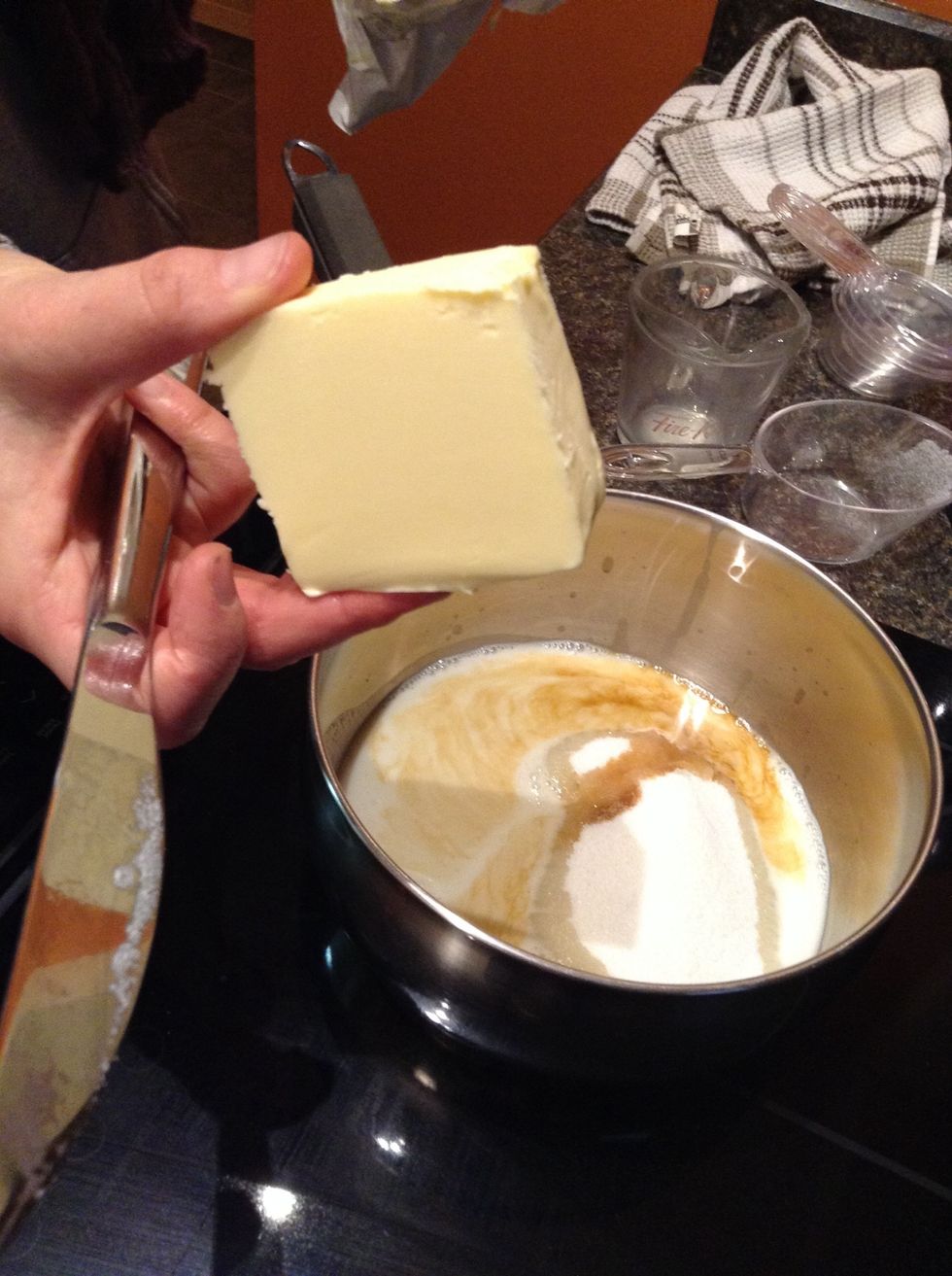 Next, put your 1/2 cup of butter into the pot.