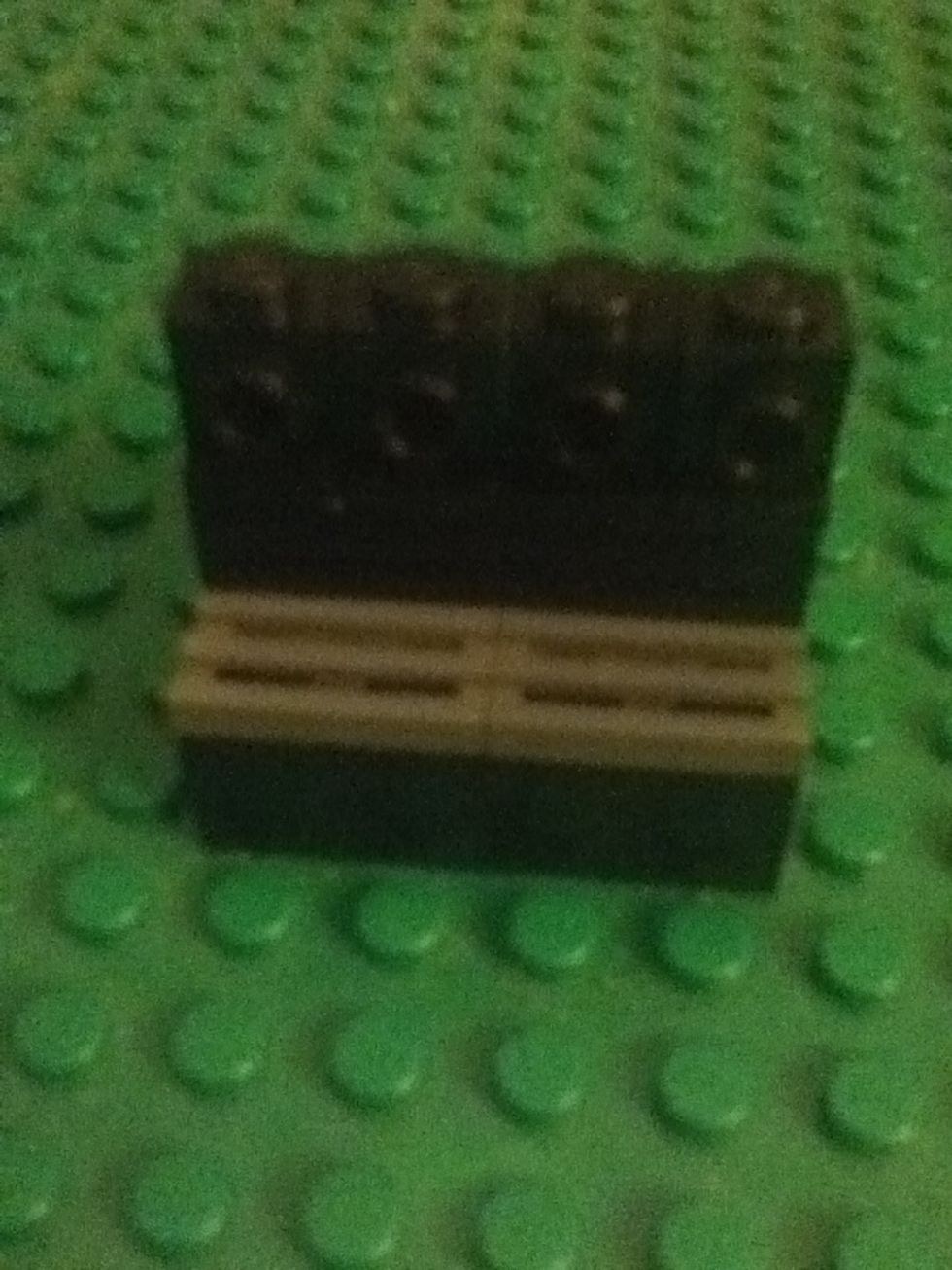 Next put your 4 1x1 stud on the side pieces along your 1x4 like so