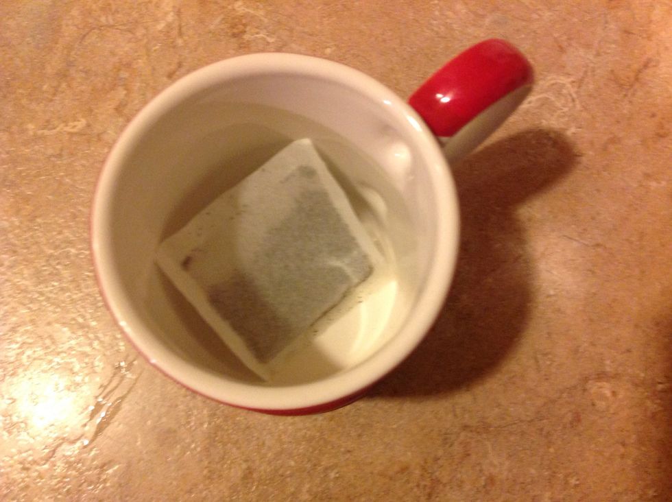 Next put your mint tea bag in your mug.
