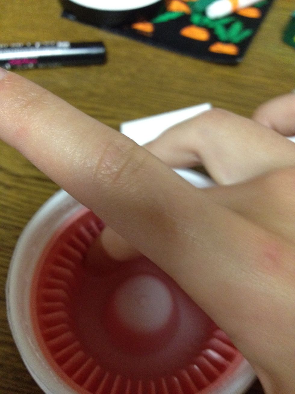 Next rub the nail on the bristles on the side (GENTLY!!) if you do not have bristles and just regular acetone then you can use a cotton bud and just rub that on your nail instead:)