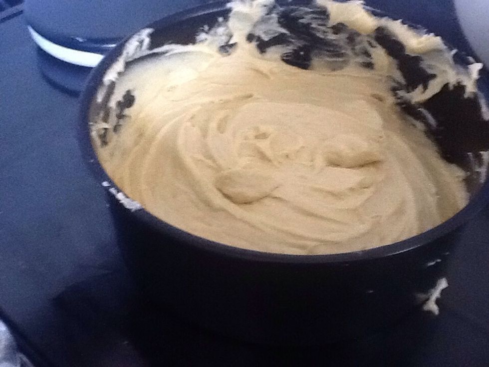 Next scope out the mixture and cover the tin in it, making sure it is even