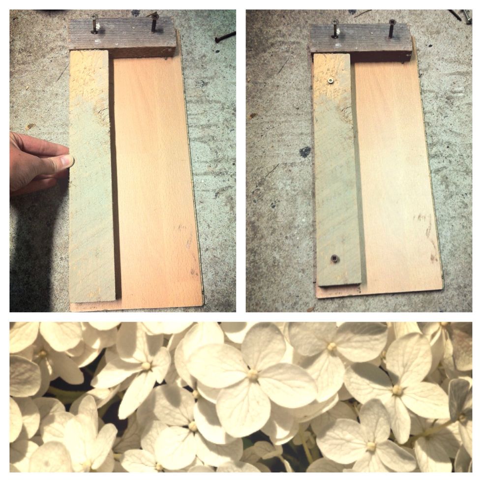 Next screw the longer strip of wood to one of the long sides of the board.