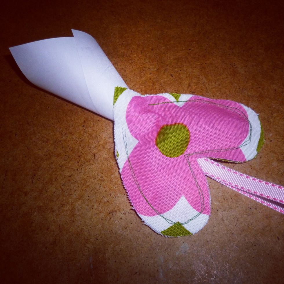 Next sew up 3/4 of your sachet leaving an opening for the lavender. I used a bright thread for the stitching - it doesn't need to be perfect. I then used a makeshift funnel for adding the lavender.