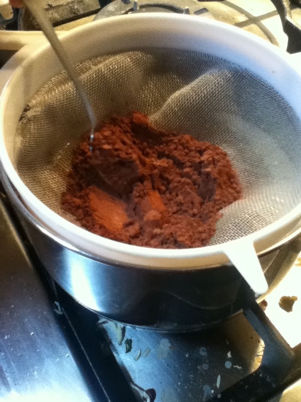 Next sieve the cocoa over the butter and sugar