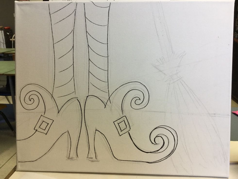 Next, sketch the end of a broom. Angle it and draw it so that the boot overlaps it. Add a horizontal line through the canvas.