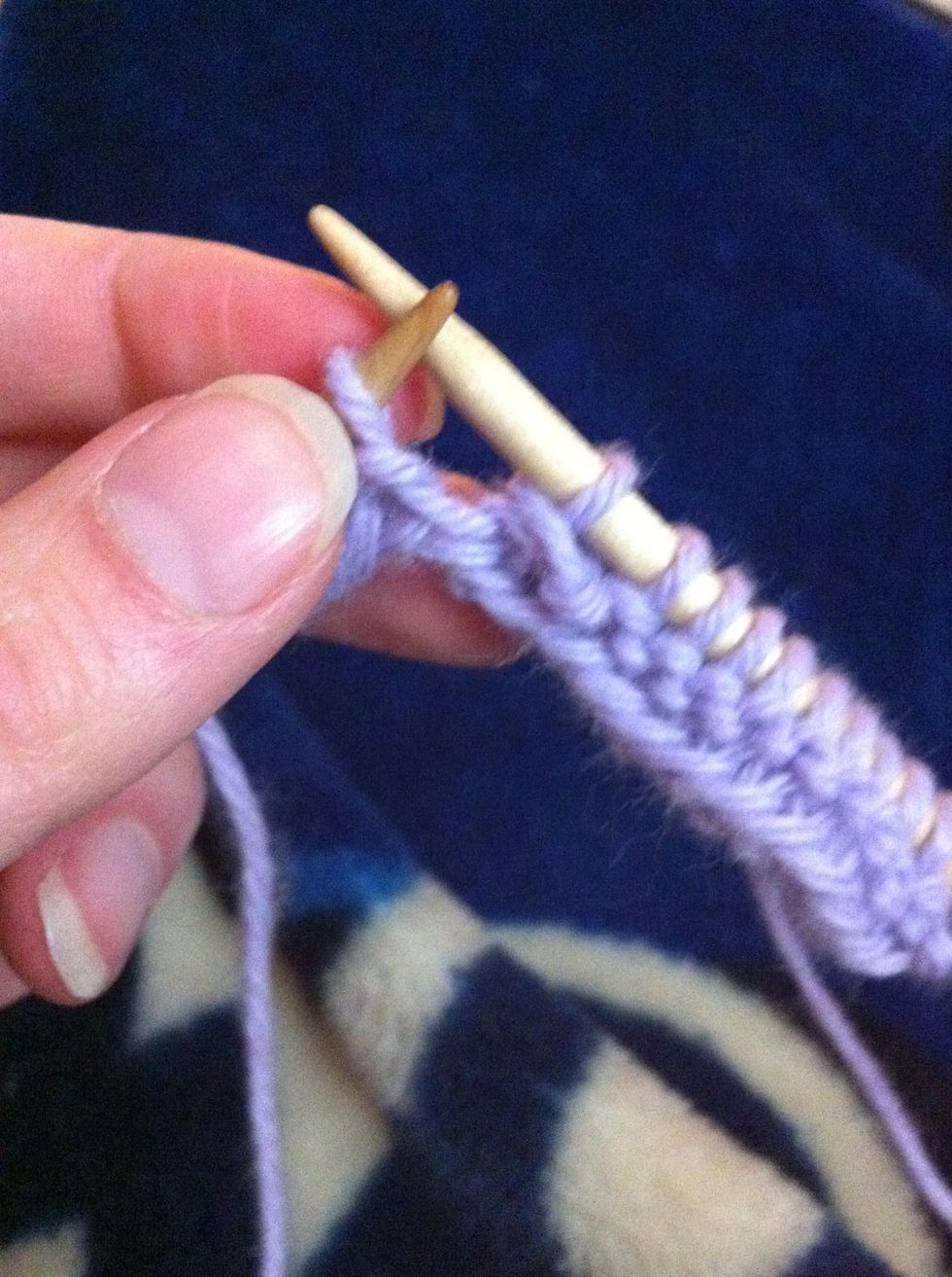 Next slip 1 st as if to purl then knit the next 2 sts together. Finally take the st you slipped & pass it over the last st you knitted & drop the slipped st off the needle.