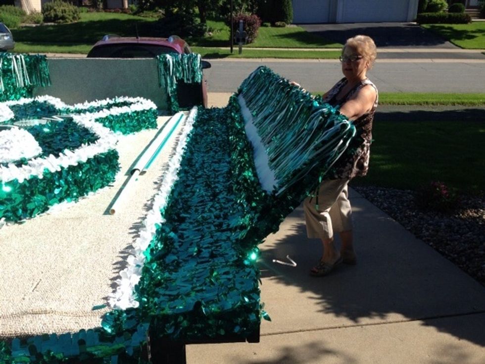 Next, slowly flip each of the four sides of the float down.