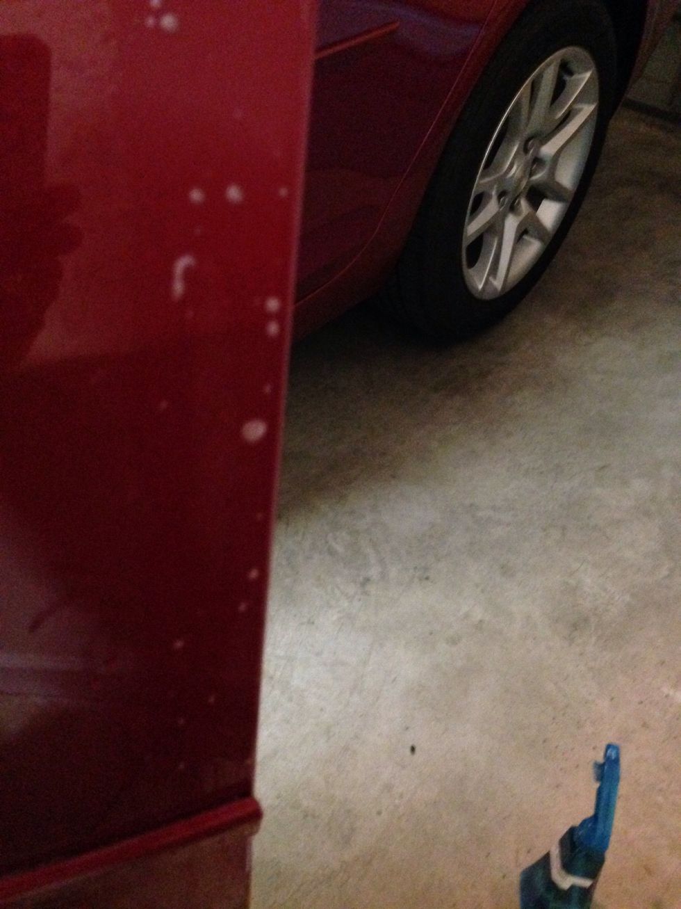 Next spray the area completely with the slip solution front and back and peel and spray the entire piece your going to put on that area.