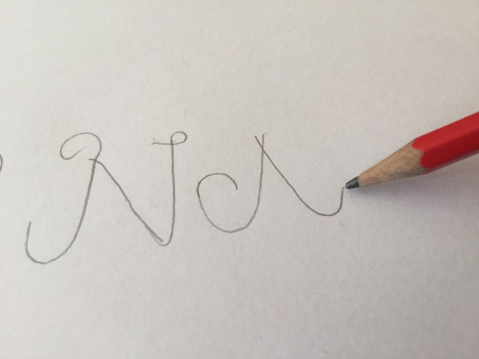 Next starting where you finished go diagonally down to make a triangle shape for your "A"