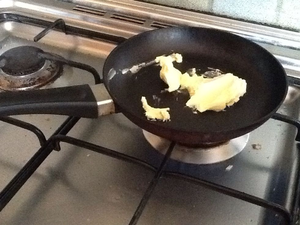 Next step I put the 1/4 cup of butter into the saucepan to melt