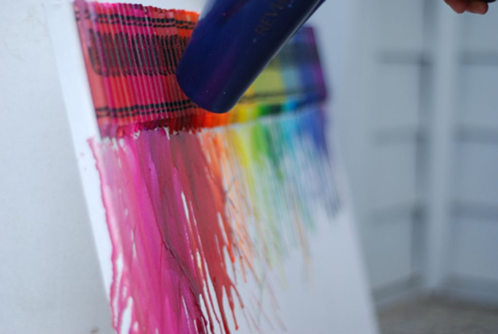 Next step is to get your blow dryer and from a distance, gently use it on the crayons.