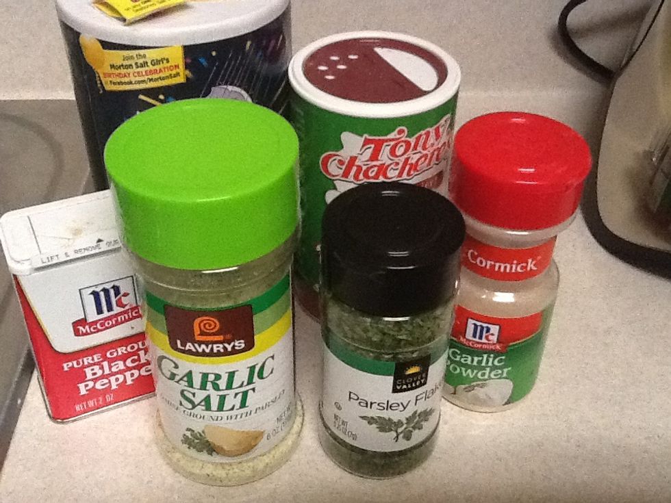 Next step prepare your seasonings. We have salt, pepper, Tony Chachere's spicy seasoning, garlic powder, garlic salt  and parsley.