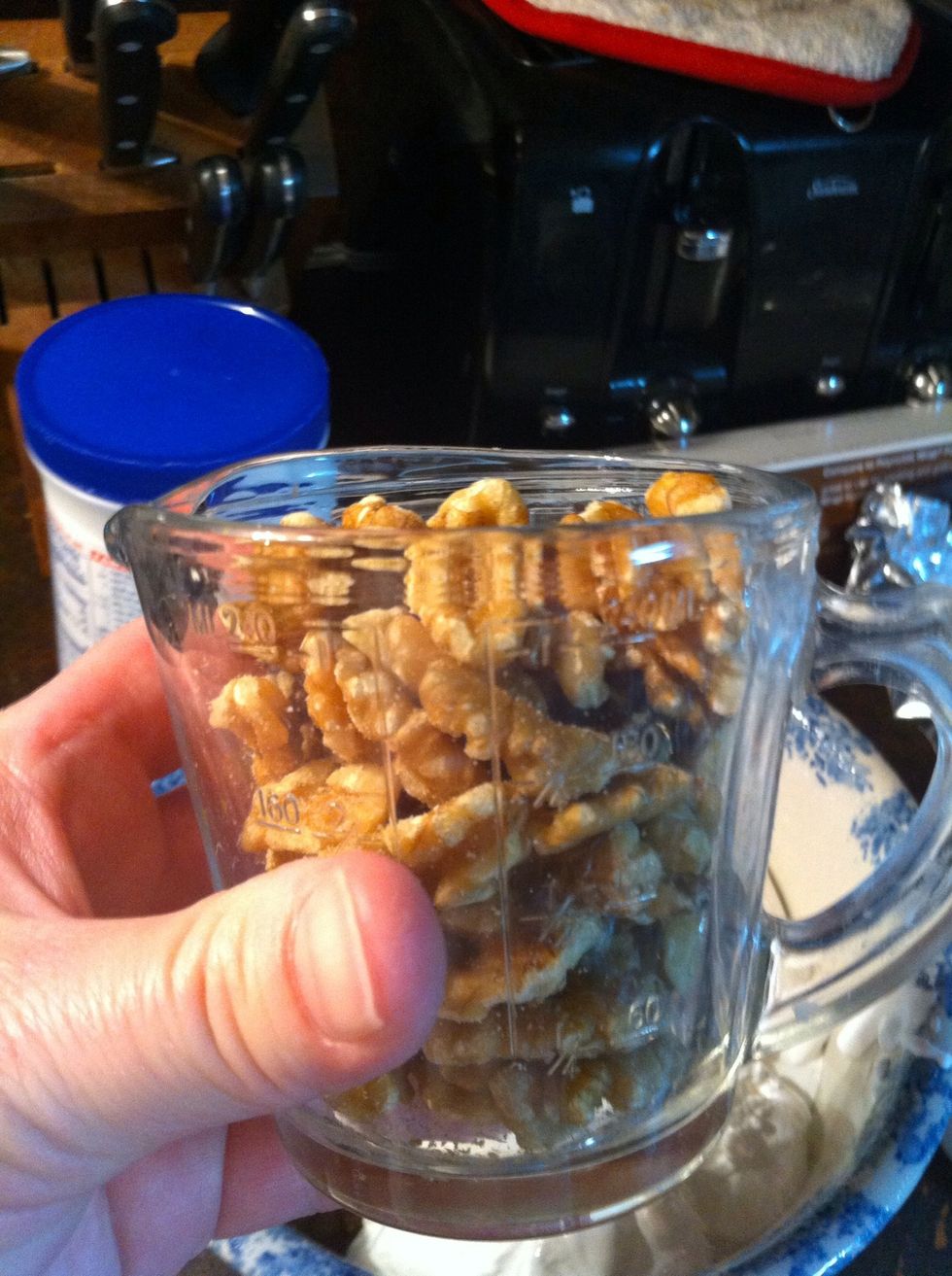 Next step will be the nuts and vanilla. Measure out 1 cup walnuts.