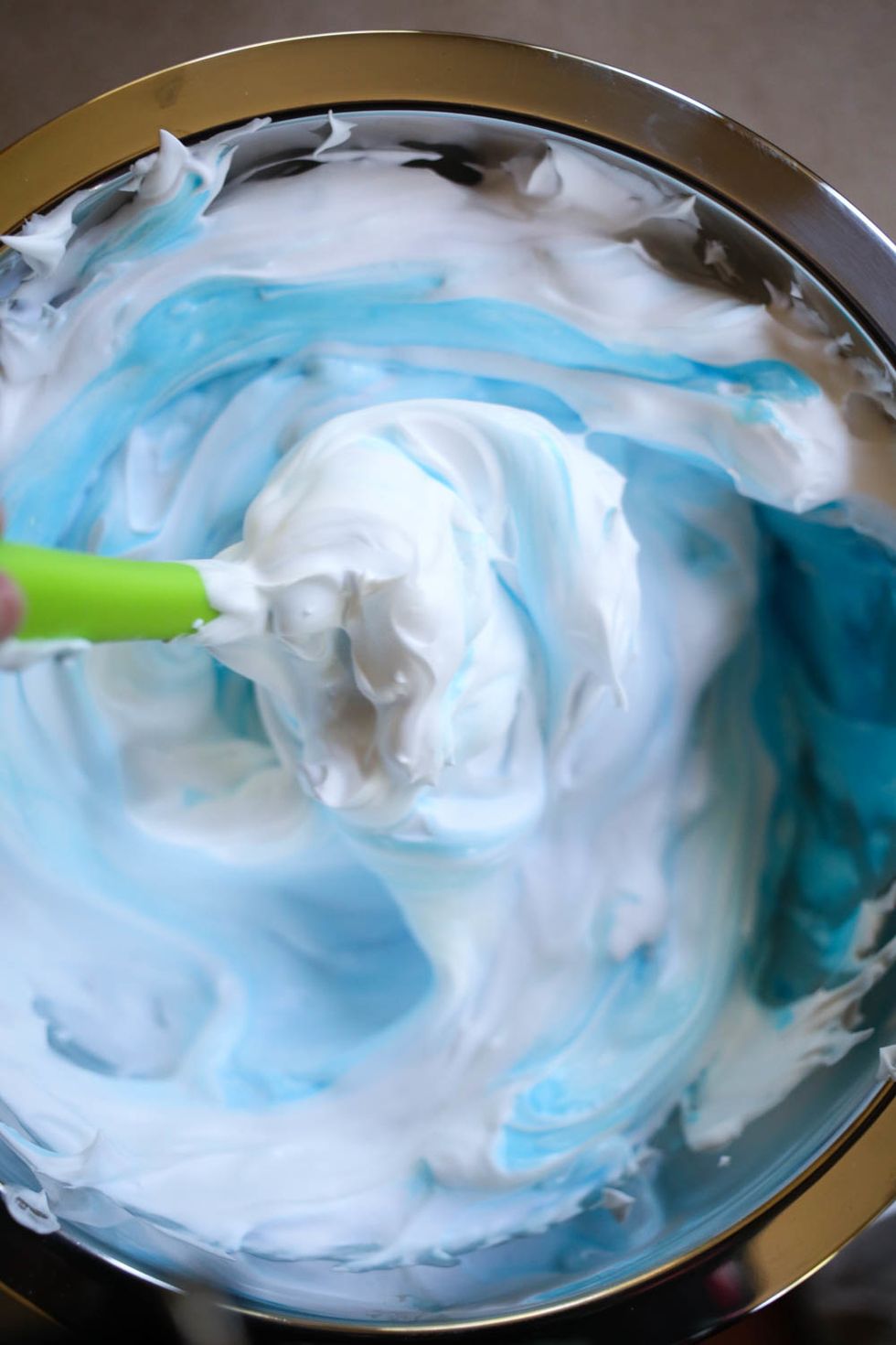 Next, Stir the glue and detergent/borax and water together.