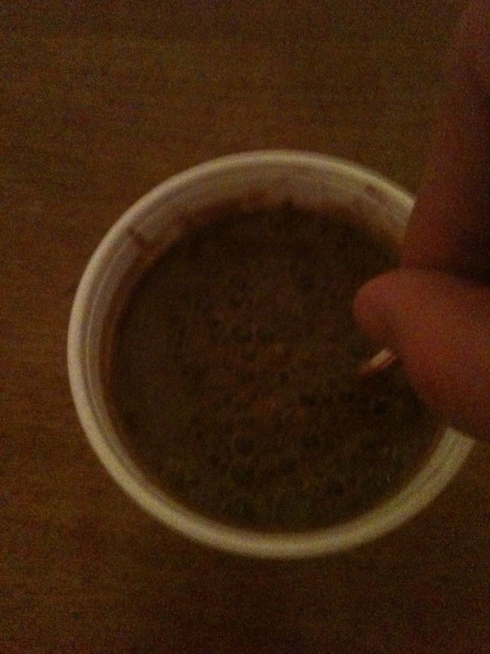 Next, stir the hot chocolate mix into the hot water/milk with the stirring straw, or a spoon if necessary, until the mix is completely dissolved.