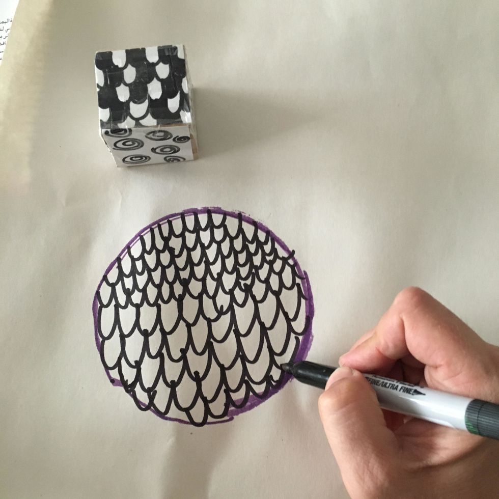 Next, student rolls 2 dice. The pattern that they roll is what they will draw in one of the circles. If they roll a 'Create Your Own' then they get to design their own pattern.