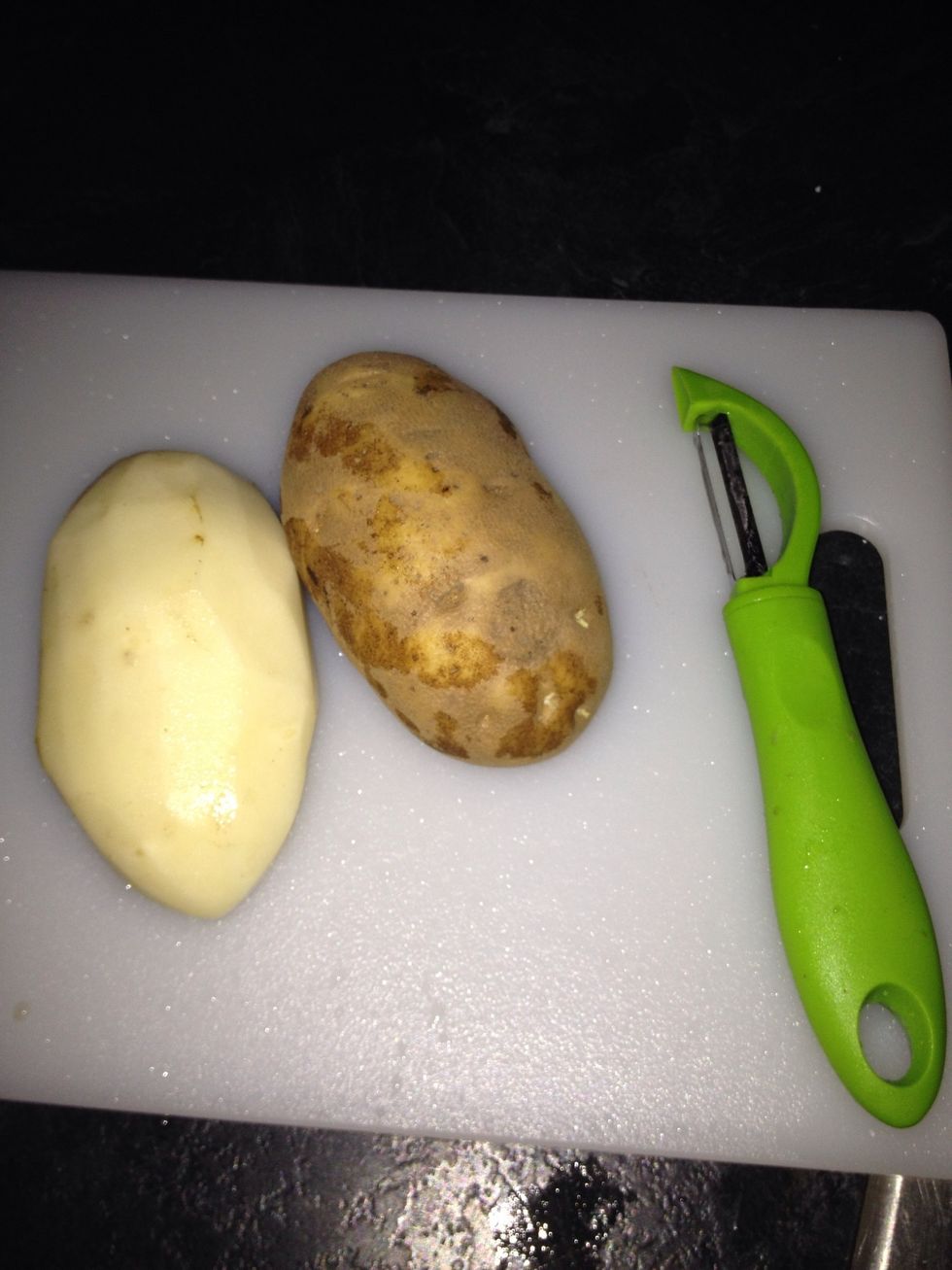 Next take 2 potatoes whatever your choice. I used Idaho.... peel, wash,and cut them into small cubes