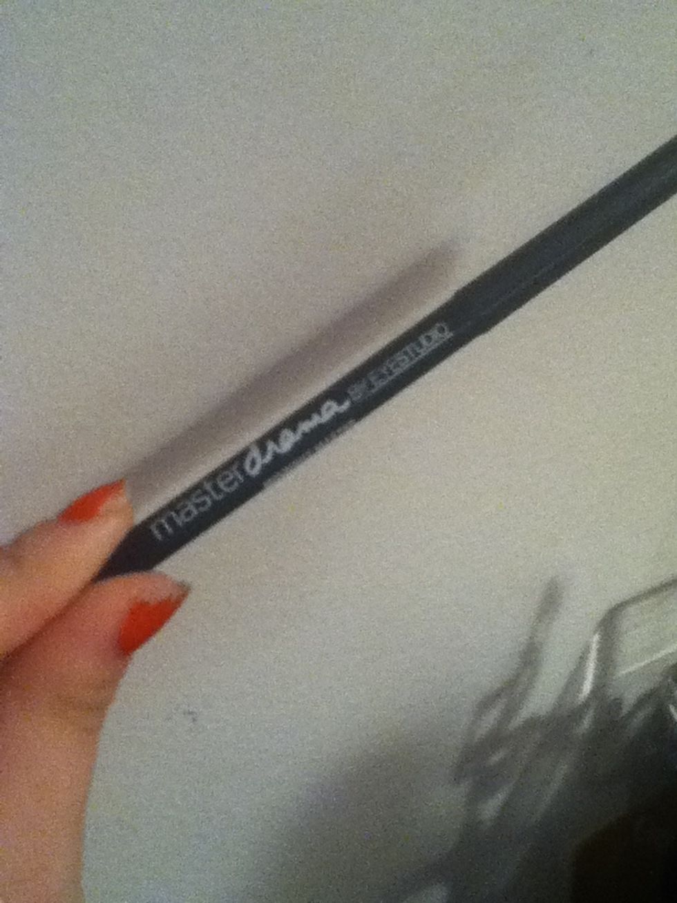 Next take a black eyeliner. I'm using Maybelline's Master Drama eyeliner in midnight Master