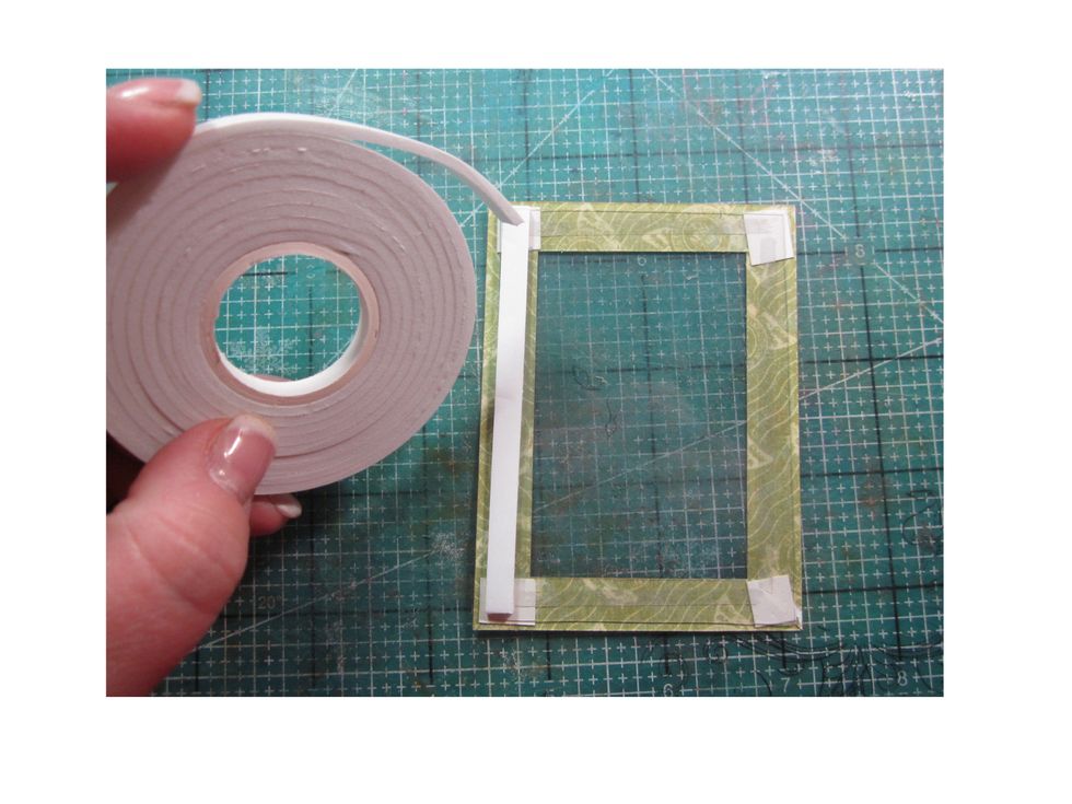Next take foam tape and run along the back over the window/frame portion.  Be sure to leave it completely butted up to each other and leave no little holes or your glitter will run out.