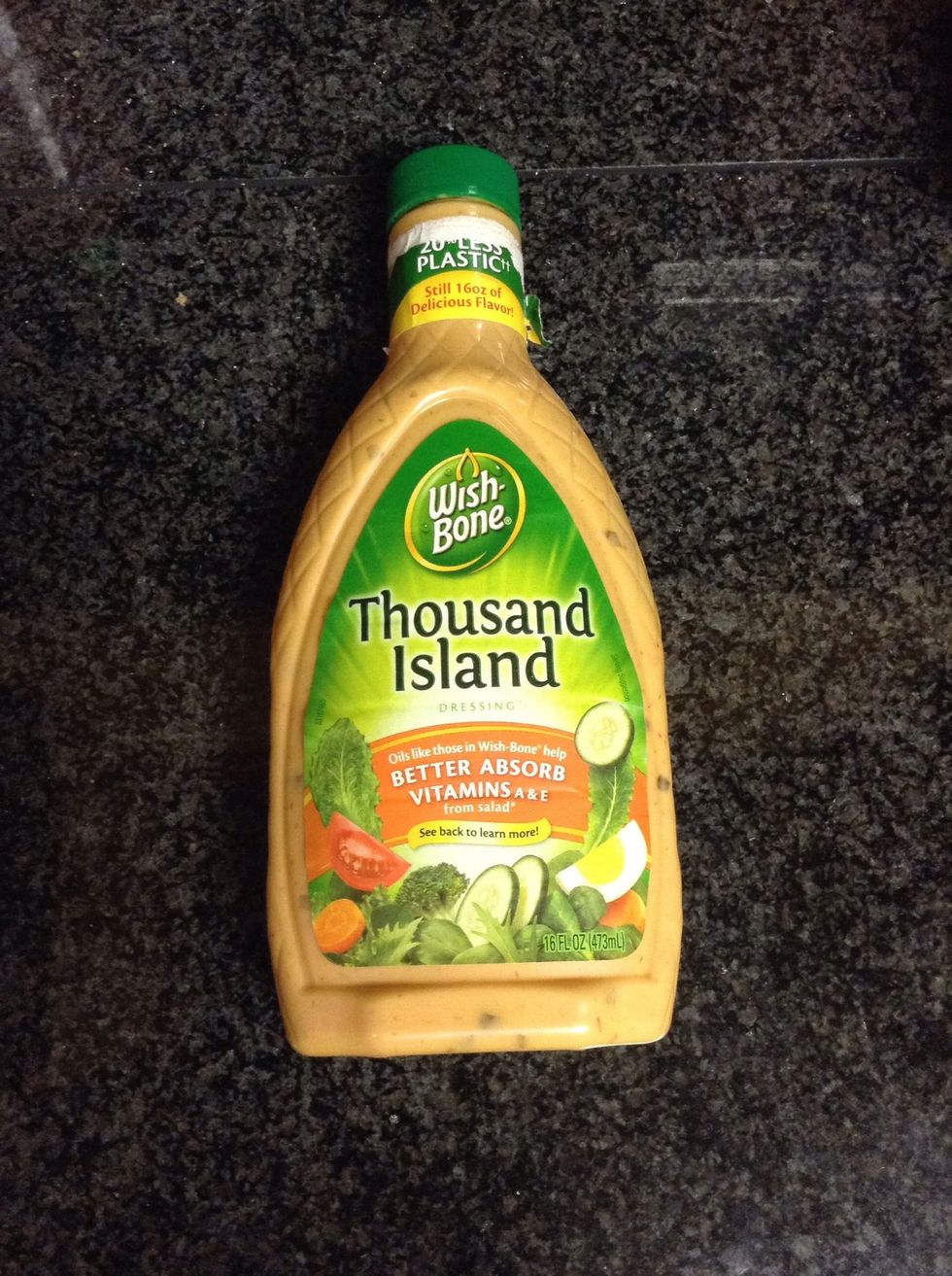 Next take half a cup of Thousand Island dressing and pour it into the buttermilk.