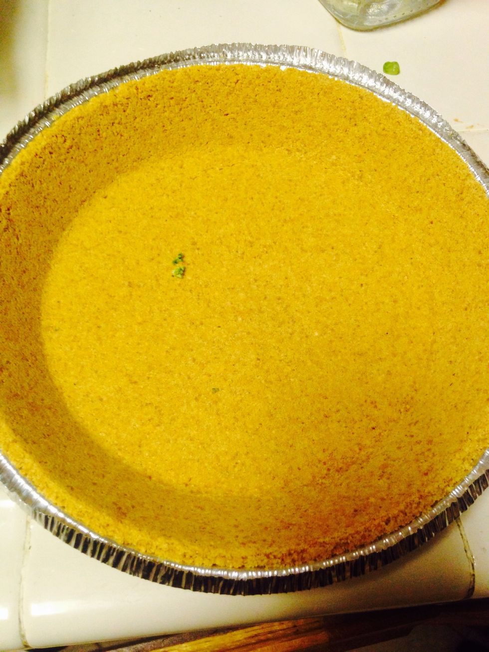 Next take off lid from your cheesecake crust or you can make your own, I choose to buy premise to make the process faster