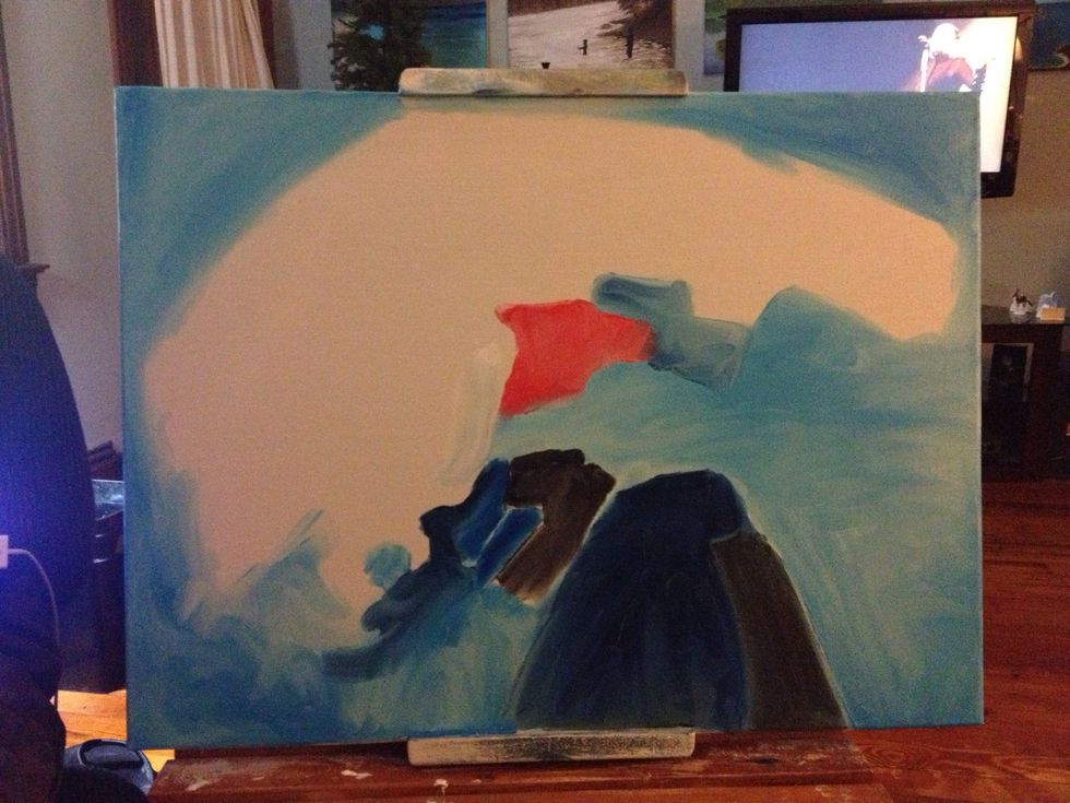 Next, take some darker blue and some black and block in the basic shape of what will be MCAs figure. Add a little red to the center of the canvas off of your bright color plate.