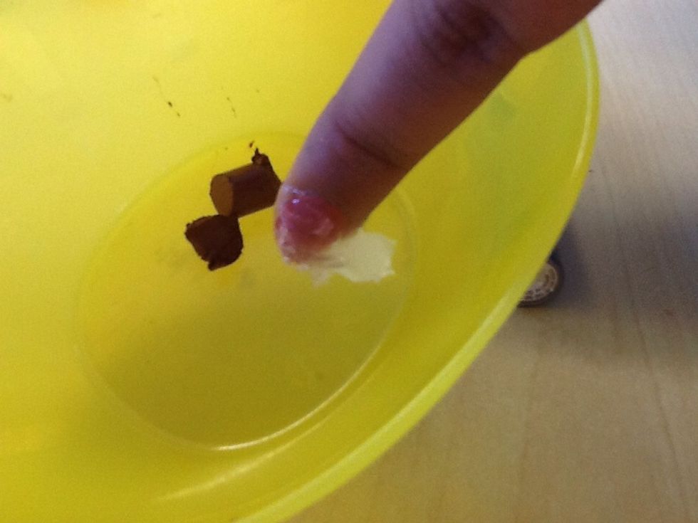 Next,take some Vaseline and add it in the bowl with the lipstick