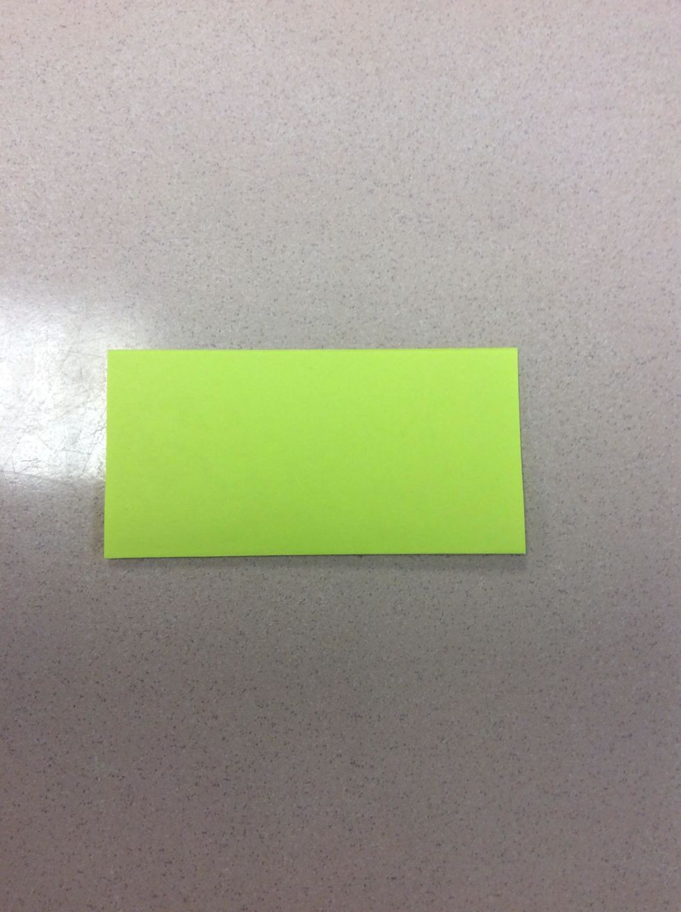 Next, take the bottom and fold it to the top, horizontally. It should look like a rectangle.