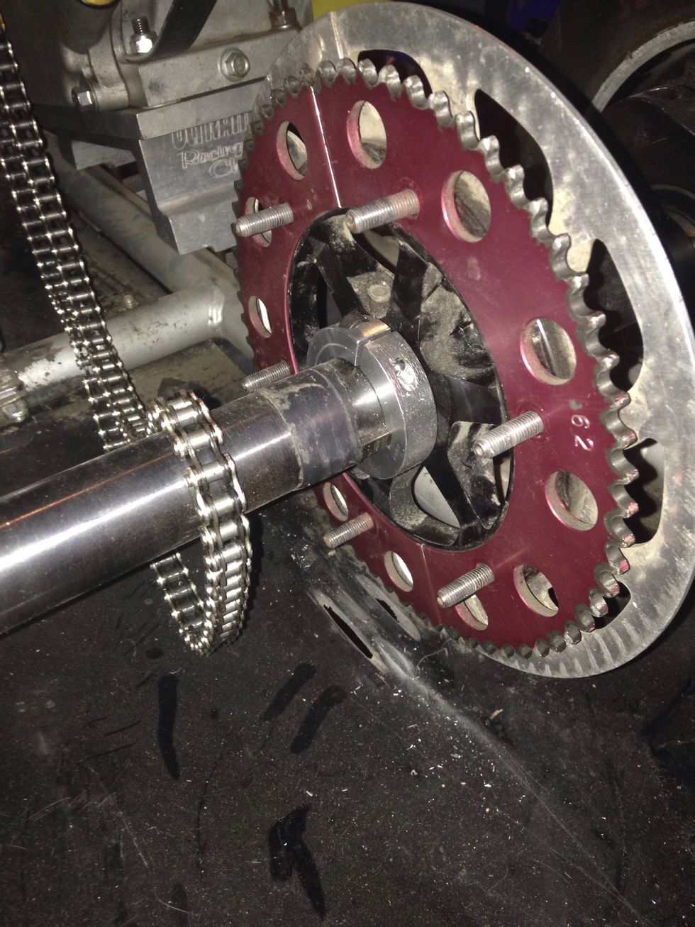 Next, take the chain off the gear.