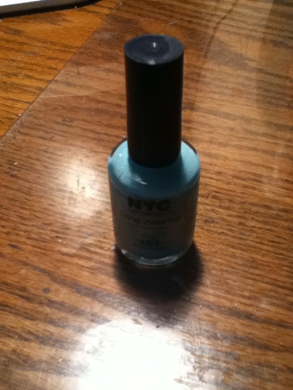 Next, take the light blue and paint small splotches on the nails coated with dark blue. It doesn't have to be perfect! Let it dry completely.