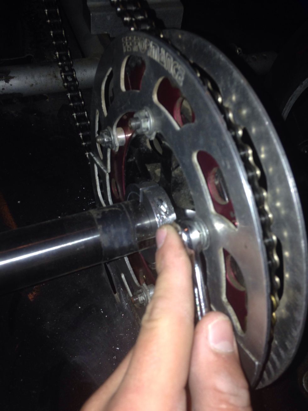 Next, take the nuts off the gear rotor.