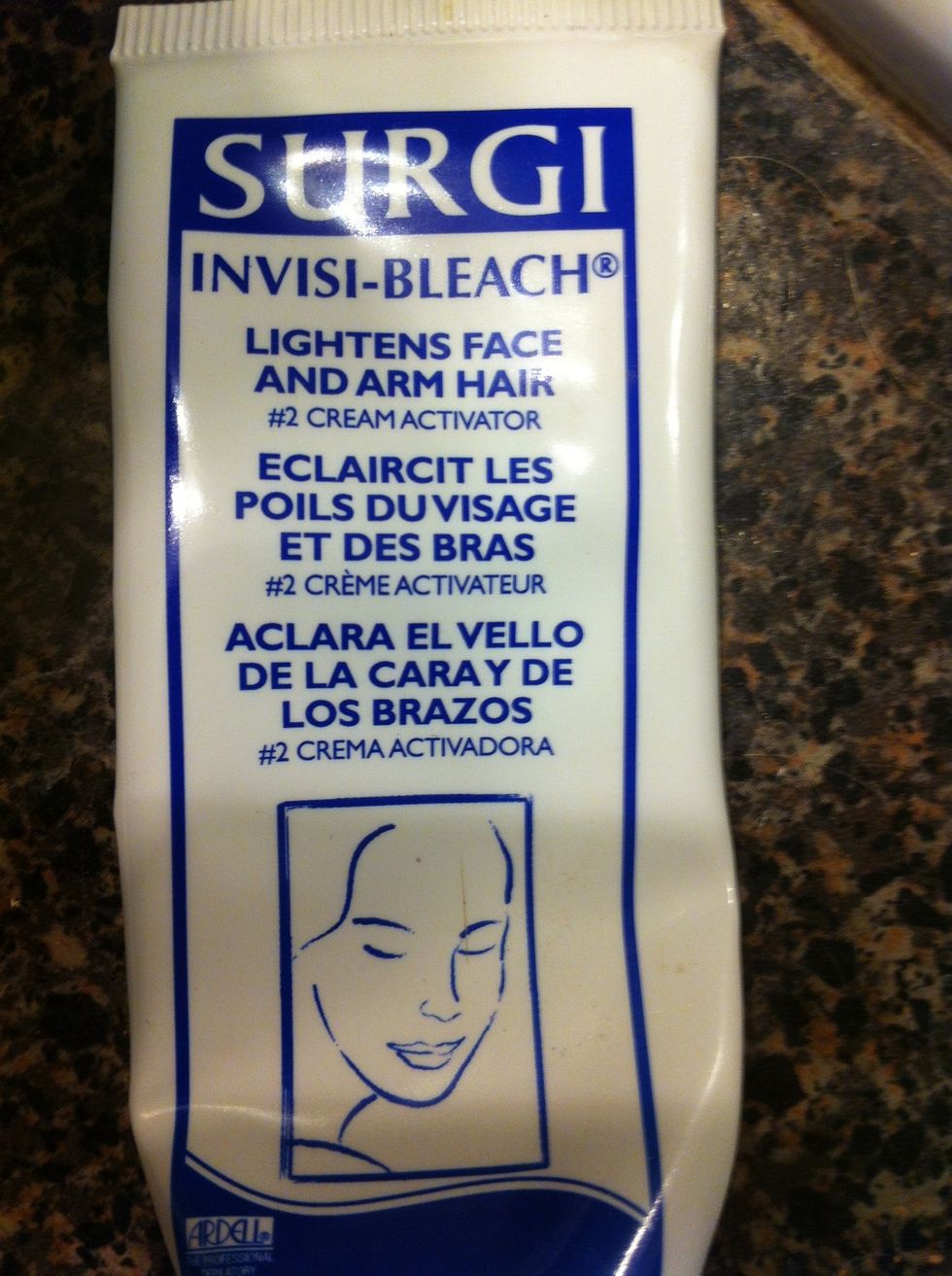 Next, take the second cream bottle and draw a line on the other cream line about halfway.