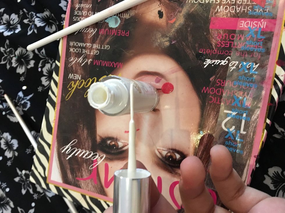 Next take ur white stripping nail Polish