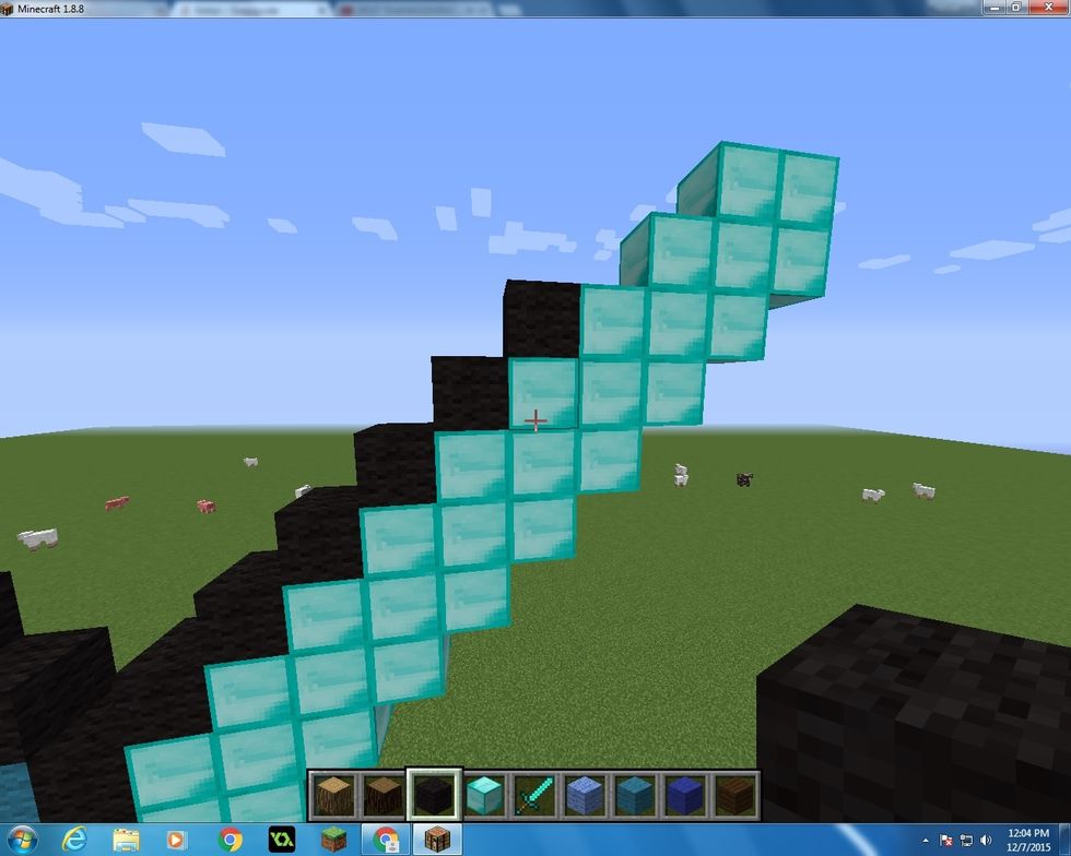 Next take you Black Wool Blocks and just fill in the outside with the wool.