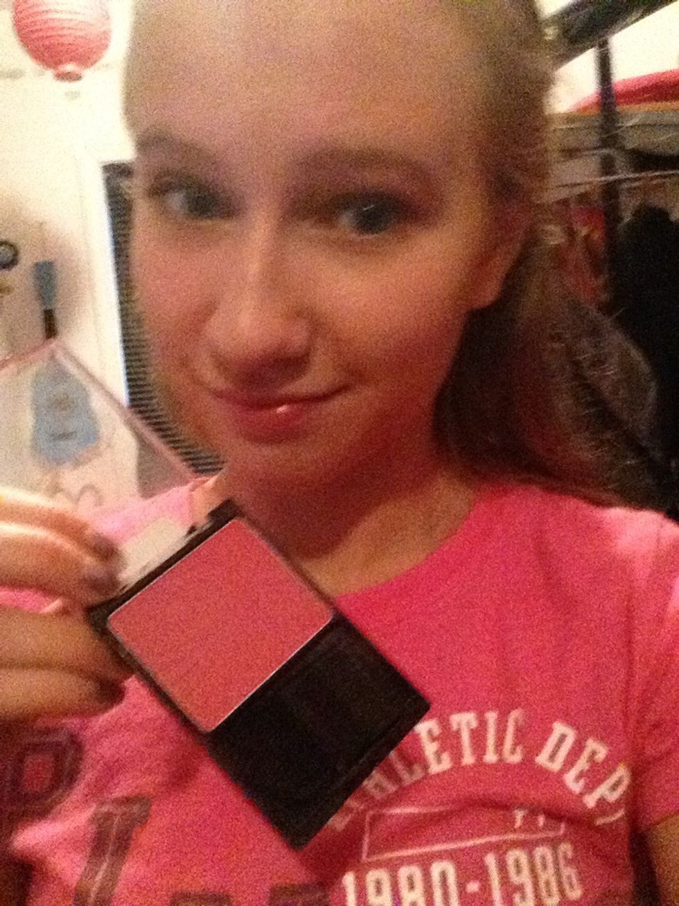 Next take you blush and get some of the blush brush.