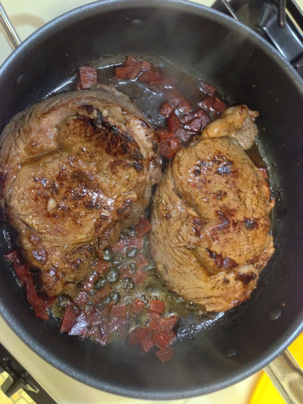 Next, take your chorizo and put on top, and in the butter in the sides, and those can get a slight char. It adds texture to your dish. And is quite tasty!