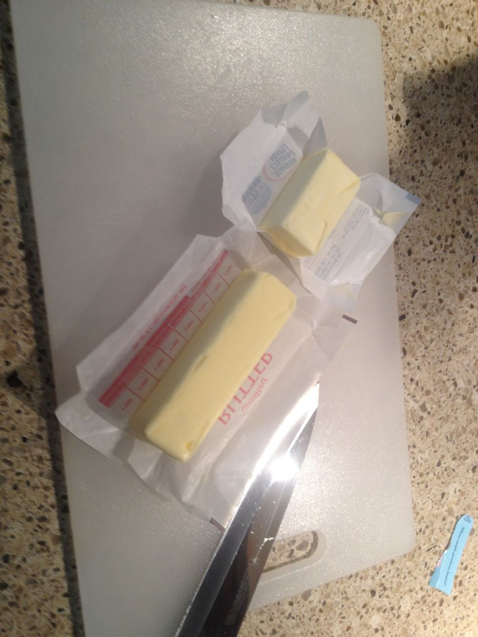 Next, take your cold butter and slice it in half long ways.