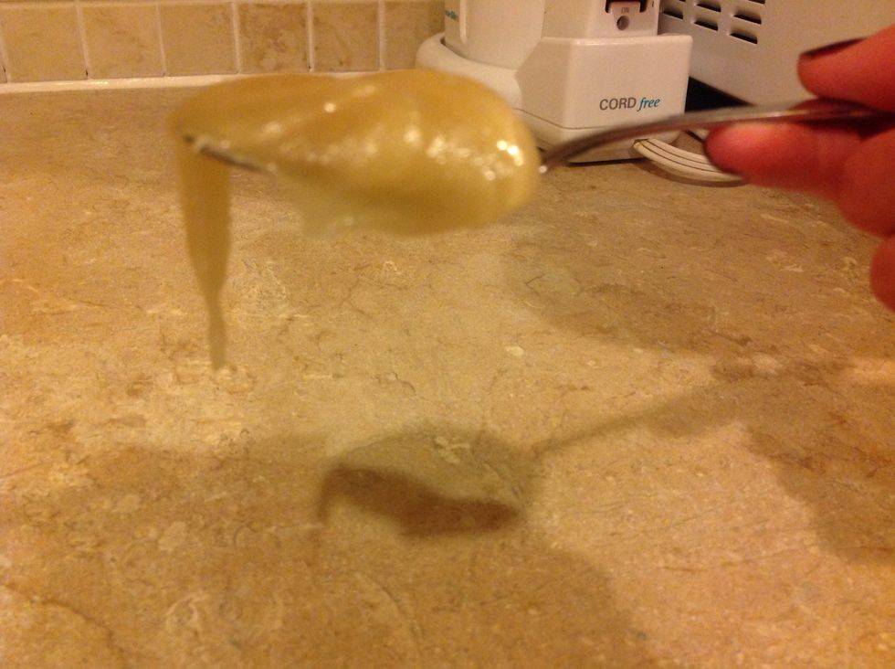 Next take your other spoon get a spoonful of honey.