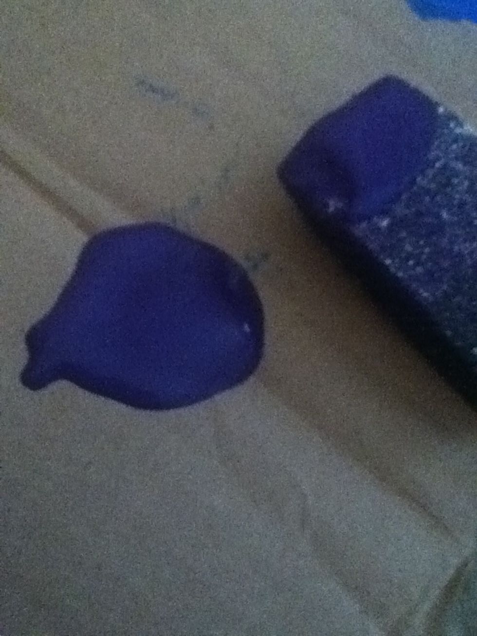 Next, take your purple paint and a different brush. Now do the same thing you just did with the blue, except with purple paint.