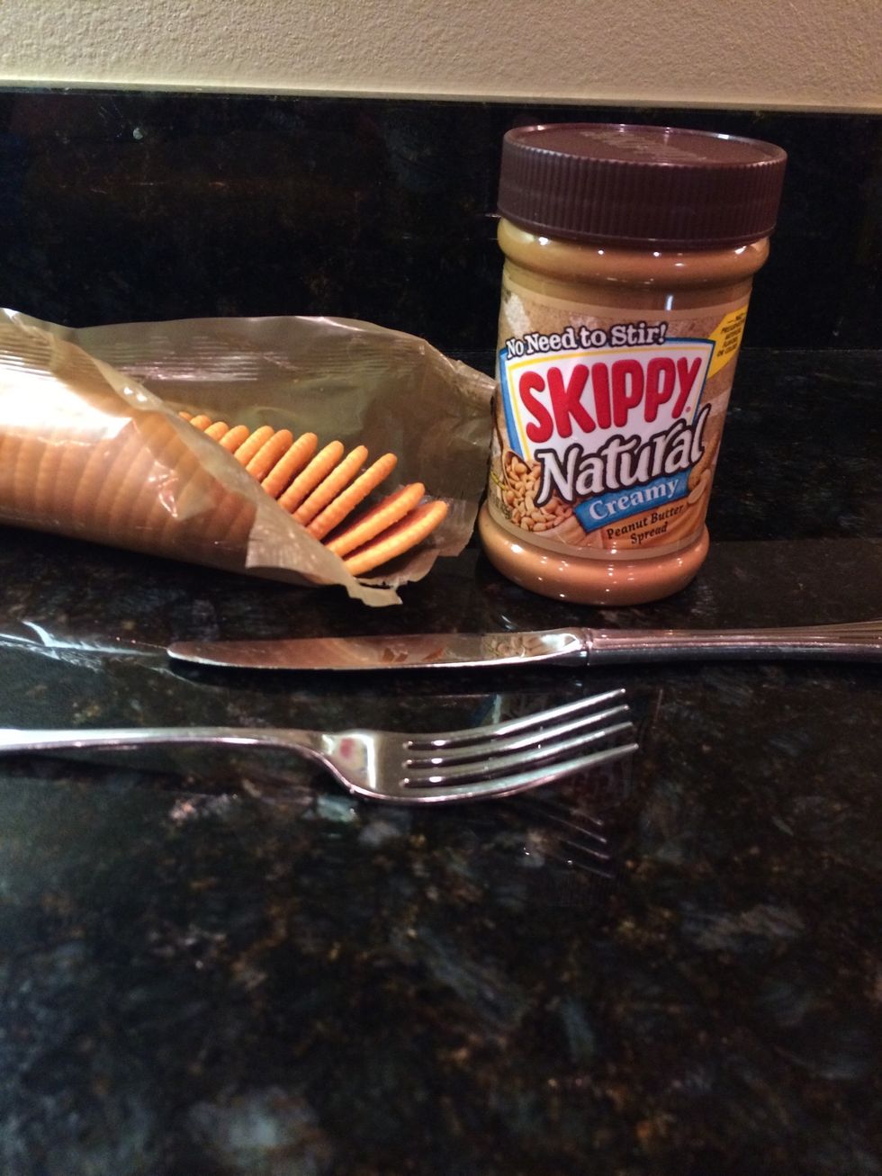 Next, take your Ritz crackers and peanut butter and get the knife ready.