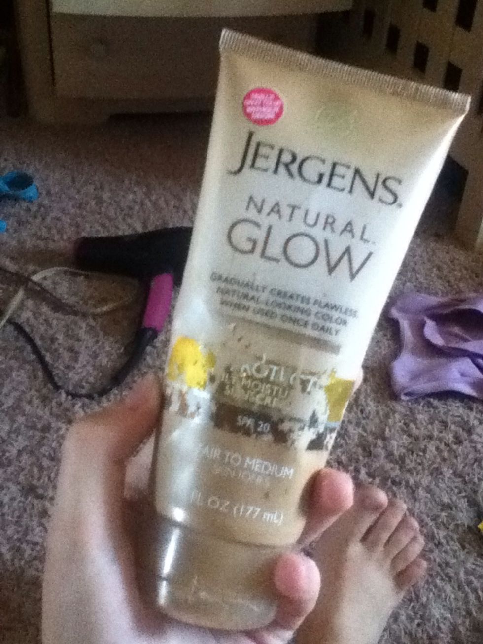 Next take your sunless tanner. This is Jergen's. it works gradually when used daily and also has SPF. I use the fair to medium shade (: