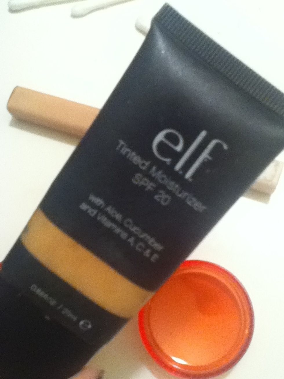 Next take your tinted moisturizer or liquid/cream makeup,
