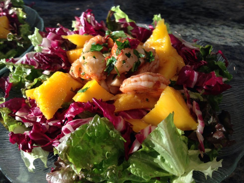 Next the grilled shrimp. I like to season them and then toss them in a bit of the dressing when still warm. Parsley makes the colors pop. The toasty pine nuts add a nice crunch here and there.