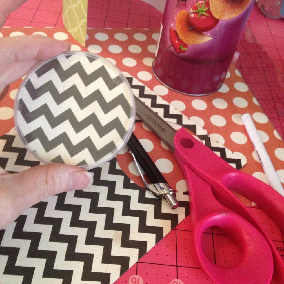 Next Trace around the lid and cut out a circle just inside the trace lines- pop it into the lid