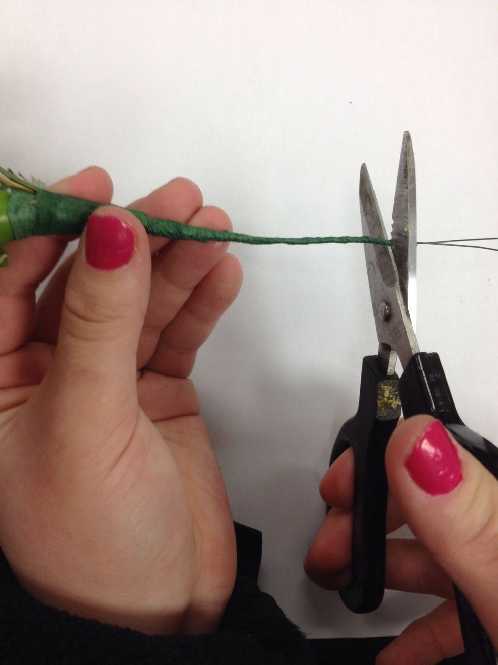 Next, trim the excess wire down to the very edge of the floral taping.