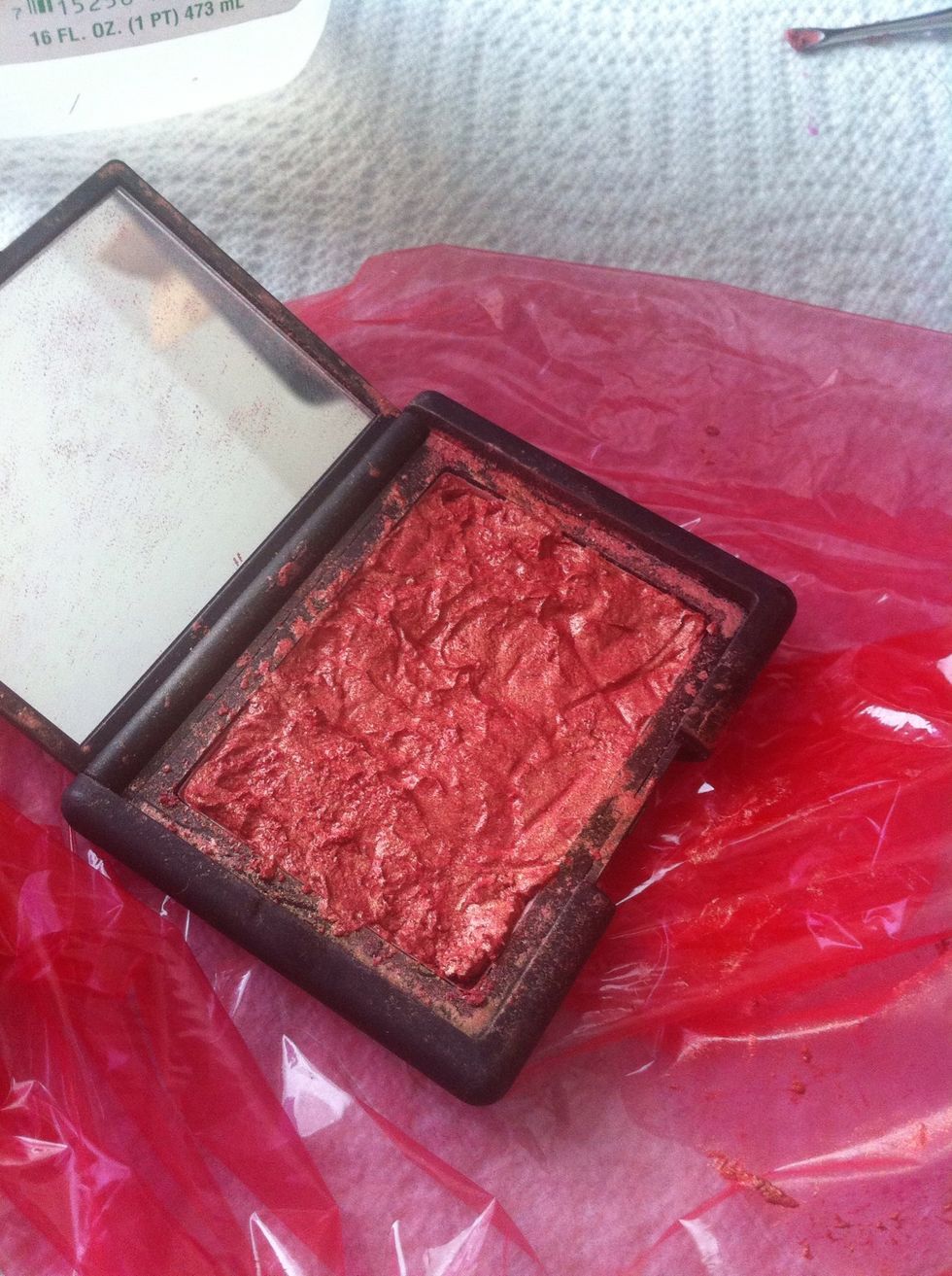 Next try to smooth it out as best as you can. Those lines are from the plastic wrap that I put over the blush to try and smooth with my finger.