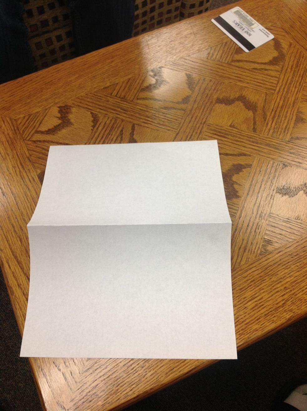 Next, unfold your paper so it's whole again.