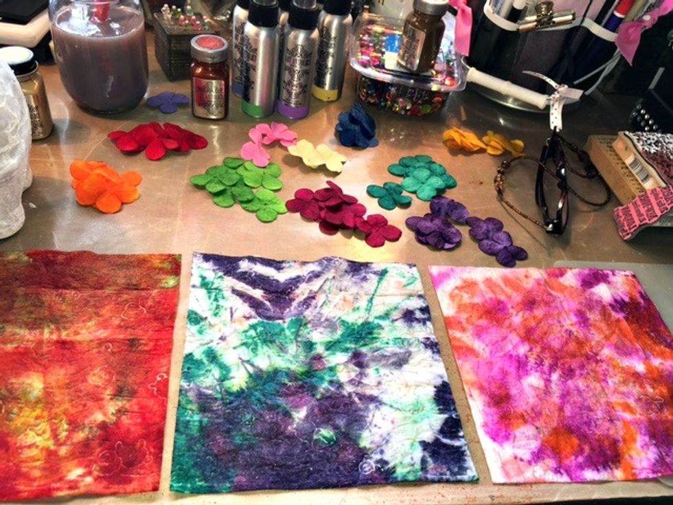 Next up, the flowers. Spray the petals with Colorations and the baby wipes to clean up the over spray, I'm saving for another project..