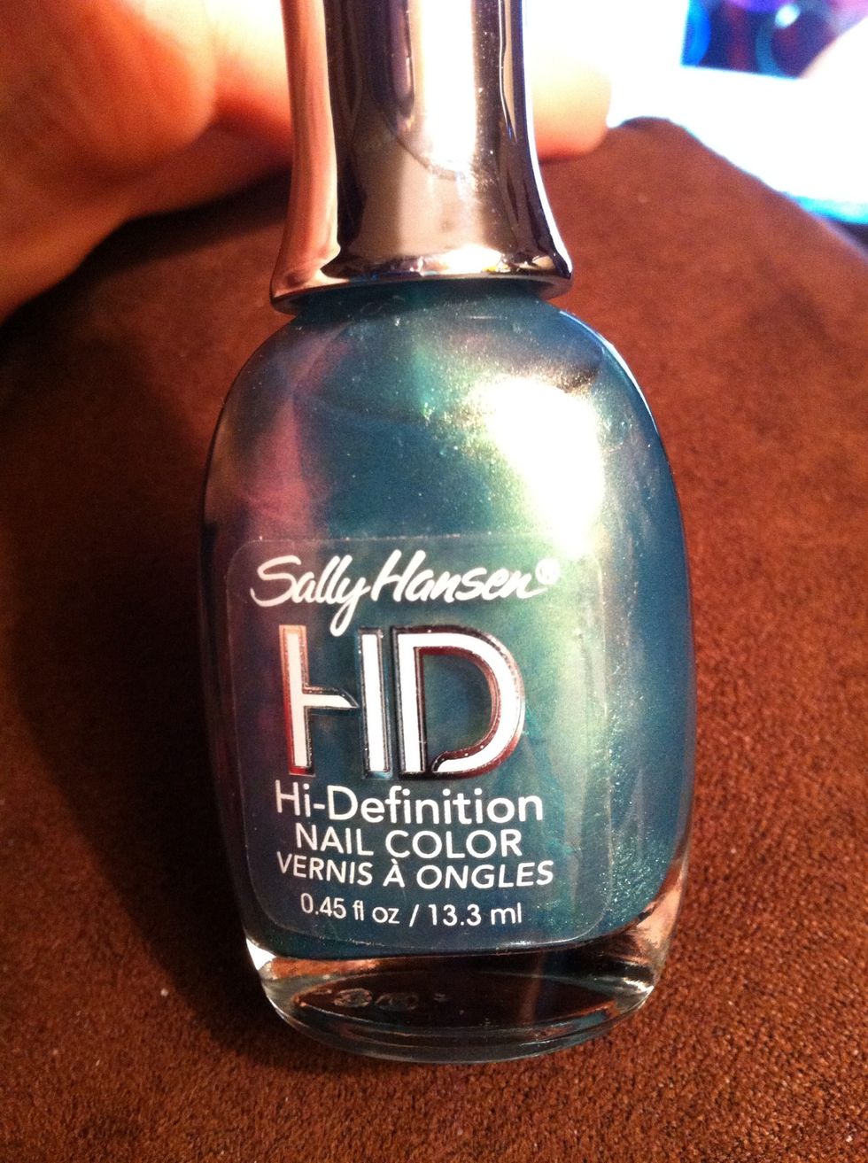 Next use a green color as an accent. I am using Sally Hansen's "hi-def" green.